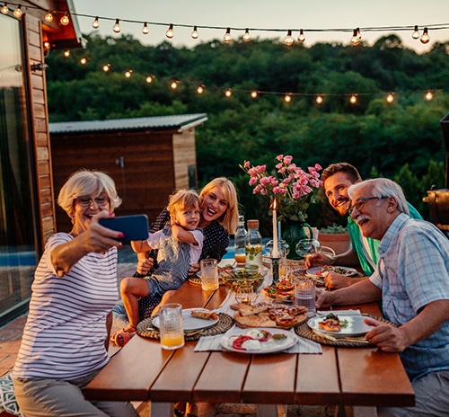 a family having a backyard barbecue